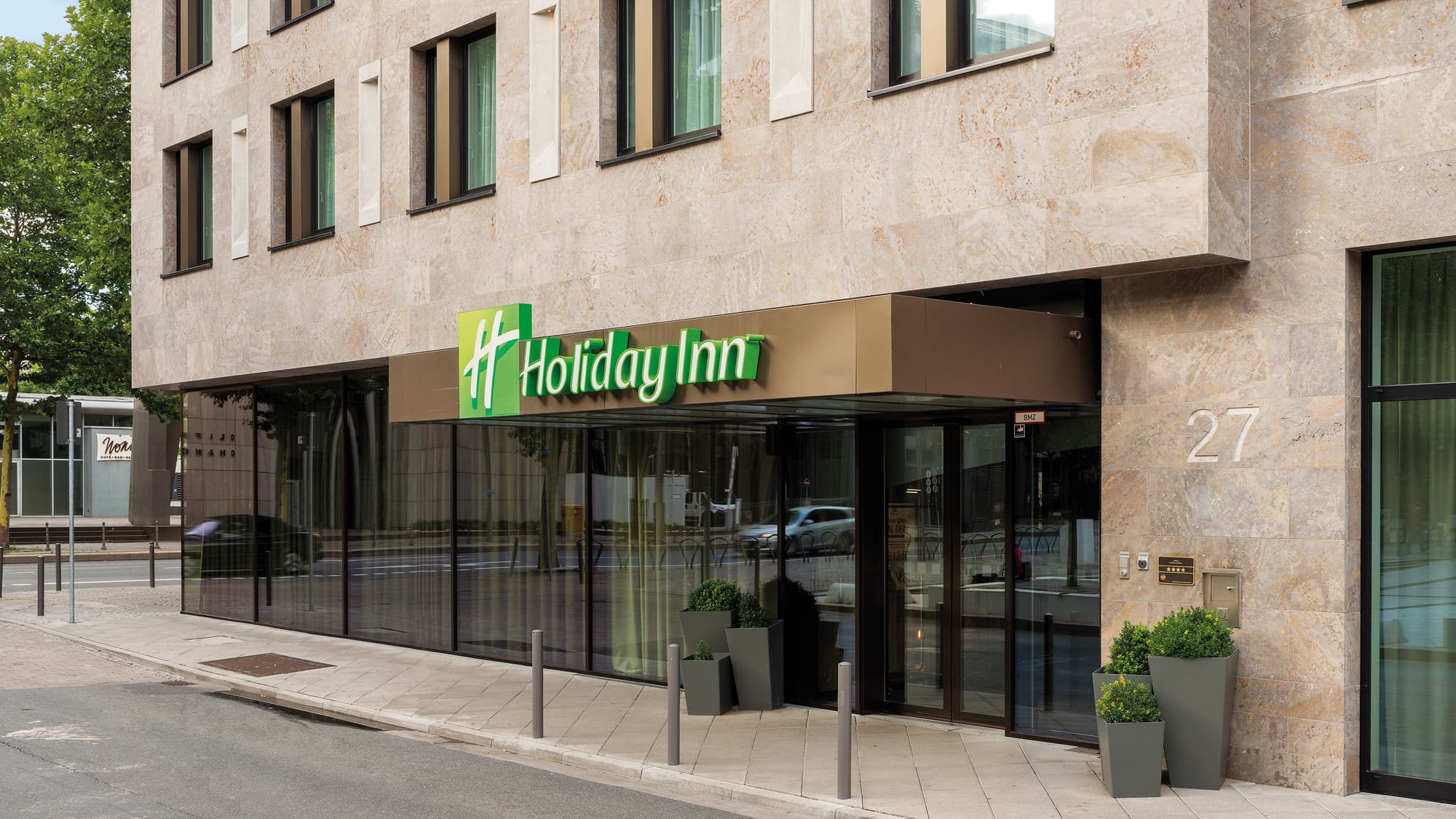 The entrance to Holiday Inn Frankfurt - Alte Oper, a four-star hotel in the Frankfurt financial district, an eight-minute walk from the Hauptbahnhof.